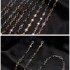 Multiple strands of pearl and gemstone beads forming a lanyard chain for sunglasses