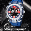 A blue digital wristwatch with a metal band and sapphire glass is shown against a dark background.