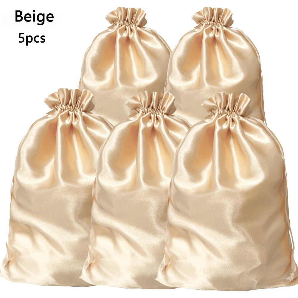 Five beige satin drawstring storage bags for hair tools