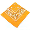 Orange fabric bandana featuring white paisley and geometric patterns