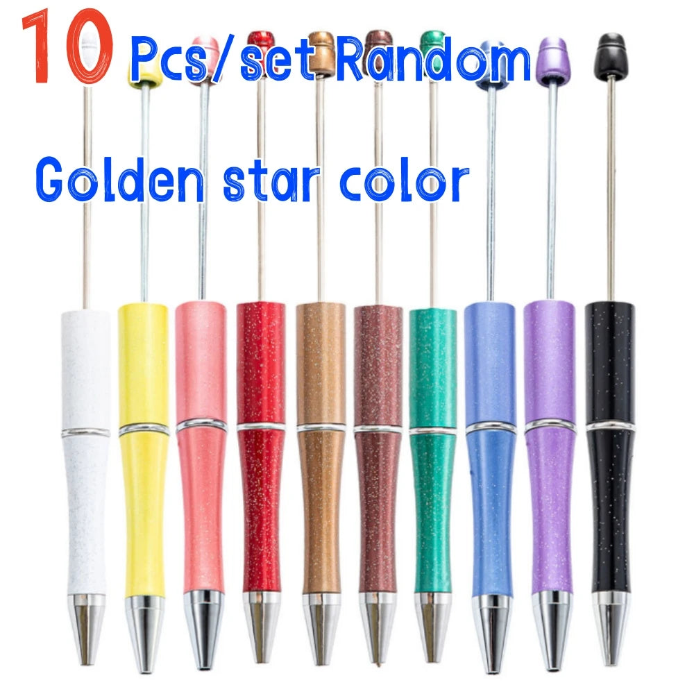 A set of ten random colored golden star ballpoint pens displayed vertically.