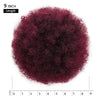 A circular display of dark magenta kinky drawstring ponytail hair extension with a 9 inch length marker.