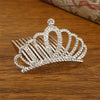 Sparkling crystal princess tiara hair comb for women displayed on a wooden surface.