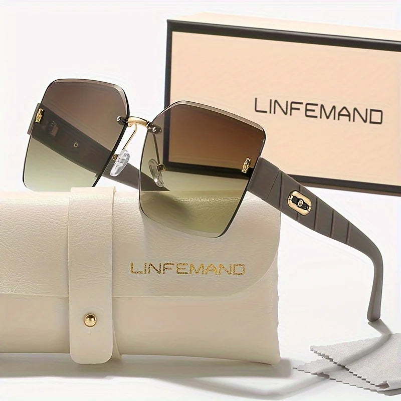 Une paire de lunettes sans monture à dégradé marron posée sur un sac à main en cuir crème et une boîte.