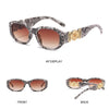 Gray and black patterned sunglasses with gold metal detail, shown from the front and back.