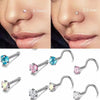 Colección de pendientes en forma de L de acero inoxidable en varios colores y acabados.