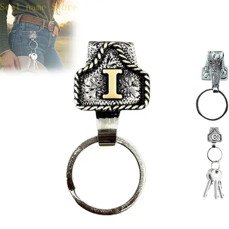 Silver and gold letter I pendant on a silver ring with a leather strap keychain.