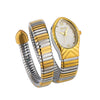 A gold-toned ladies watch featuring a snake design on the strap and a silver dial.