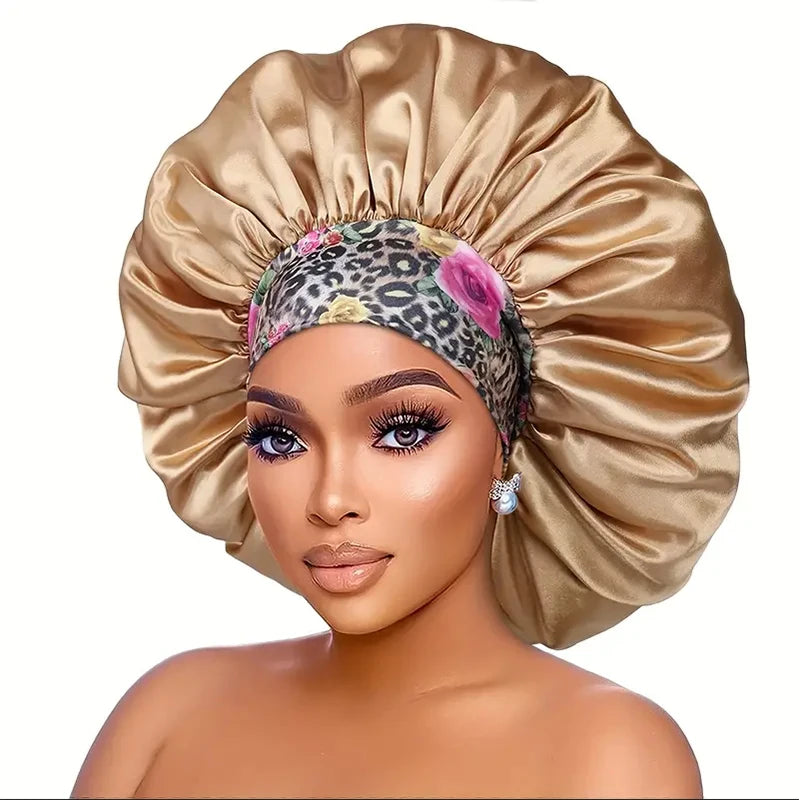 A woman wearing an extra large satin sleep bonnet with an elastic band and a leopard print headband.