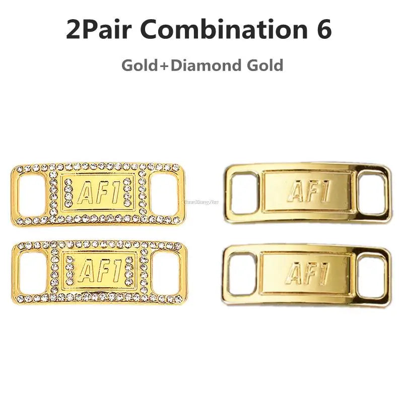 Two pairs of gold and diamond gold shoe charms and laces for a combination set