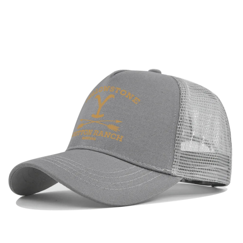A gray adjustable baseball cap with a gold embroidered logo featuring the text STONE RANCH.