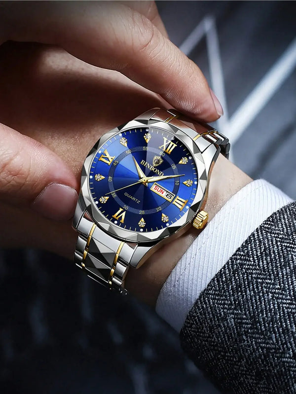 A close-up shot of a men's watch with a blue dial and gold accents being held by a hand against a dark background.