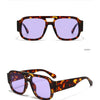Vue de face des lunettes de soleil C9 demi/violet avec montures en écaille et double pont.