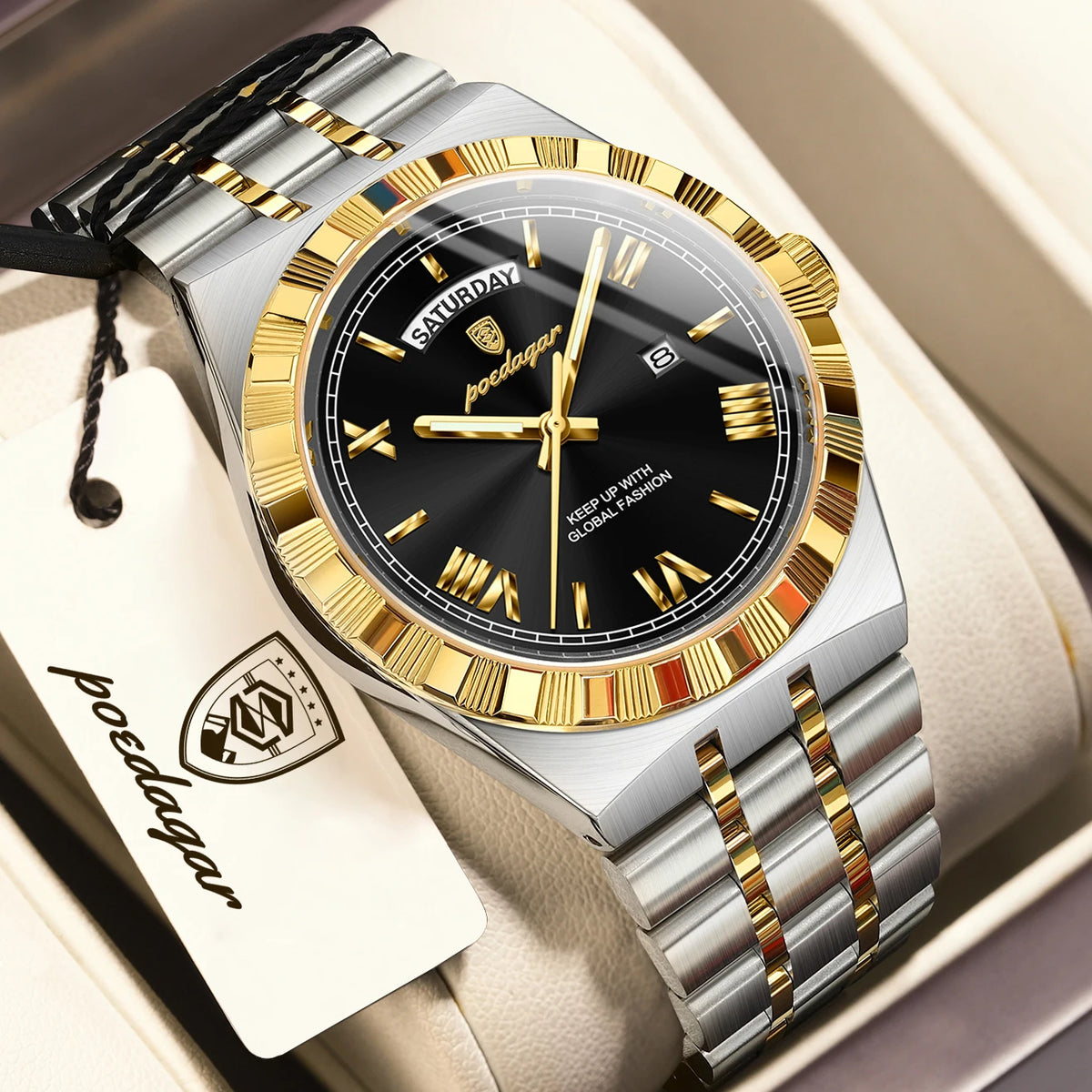 A silver and gold men's watch with a black dial and luminous hands is displayed in a box.