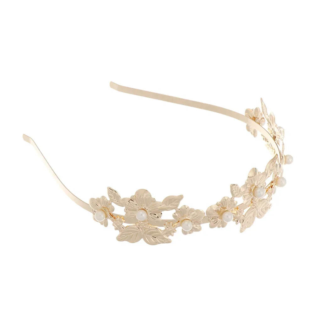 Gold leaf headband for bridal or party decoration featuring delicate floral elements