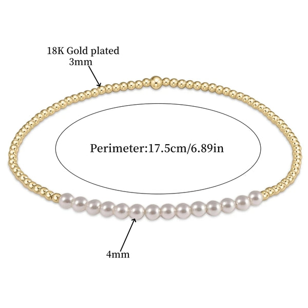 A close-up of a 18K gold plated pearl beaded bracelet with a 3mm chain and a 4mm pearl strand.