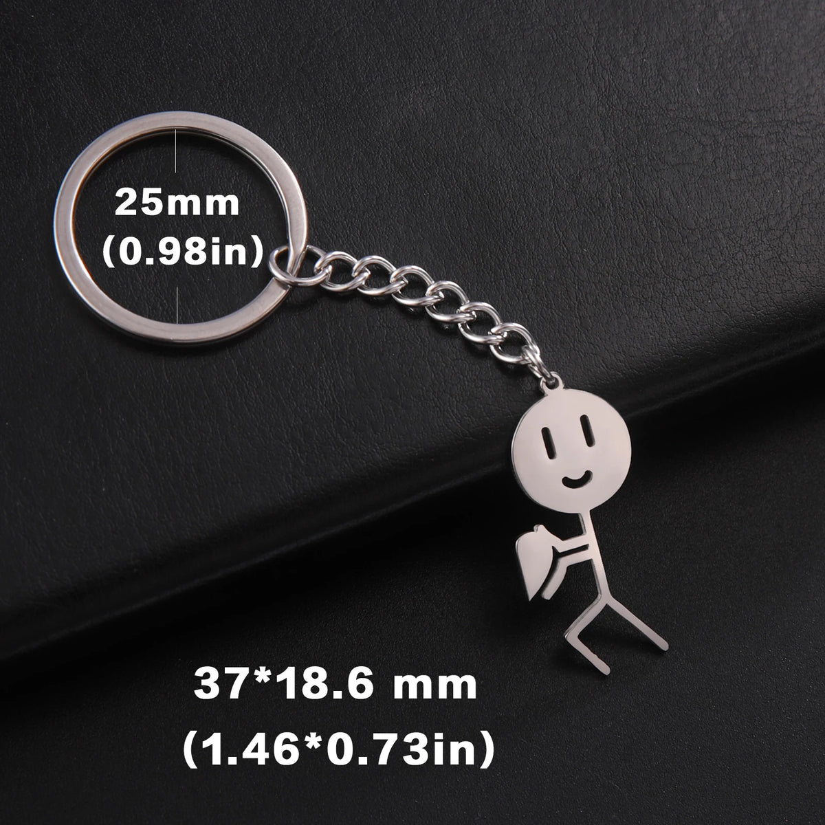 Silver keychain featuring a stickman figure and a circular tag with dimensions 25mm (0.98in).