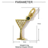 Charm en verre triangulaire doré, fait de cuivre et de pierres de zircon.