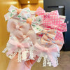 Pink and white flower bow hair ties for girls with lace accents