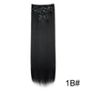 A bundle of long, straight black hair extensions with small metallic clips.