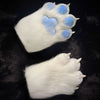 A close-up of a white paw print with light blue pads, used as a background for furry gloves.