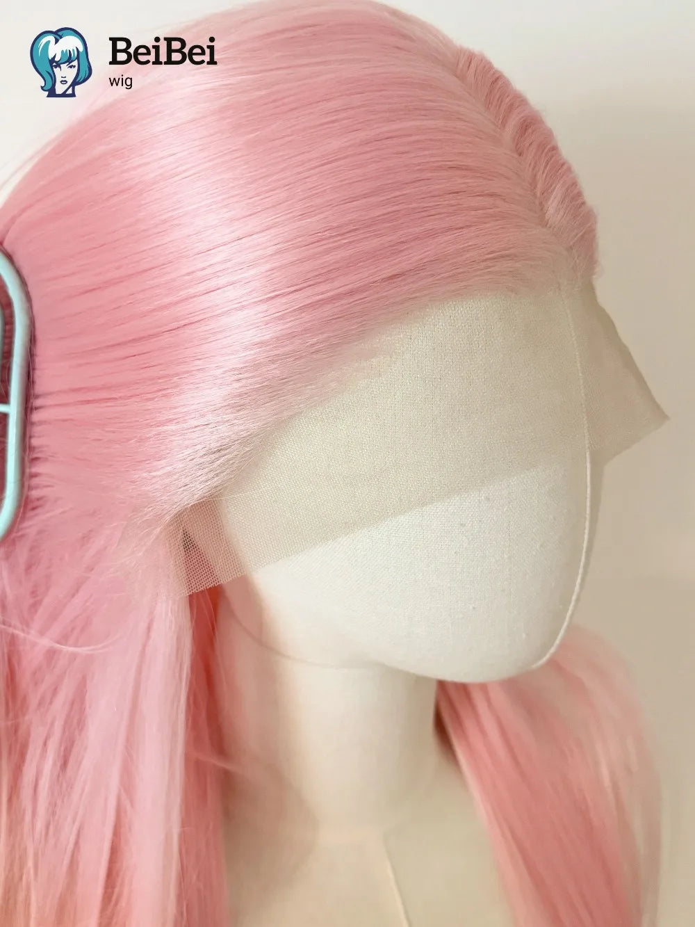 A close-up of a long straight glueless synthetic wig in pink hair displayed on a mannequin head.