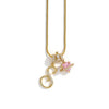 A gold letter S pendant necklace featuring a pink flower charm on a white background.
