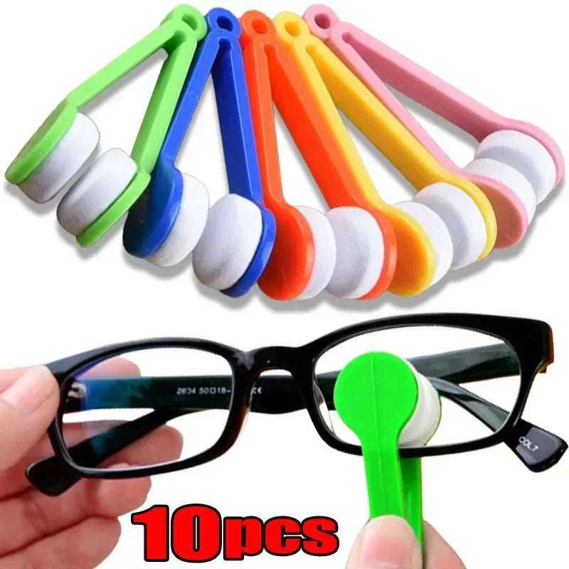 A set of ten colorful silicone cleaning tools and a green cleaning stick for eyeglasses.
