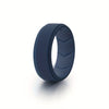 A close-up view of a dark blue silicone wedding band ring.