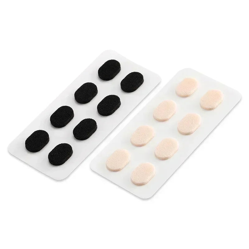 Un plateau blanc contenant des embouts de nez pour lunettes réutilisables autocollants noir et rose.