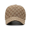 A beige cotton baseball cap featuring a brown dot pattern.