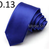 A dark blue satin neck tie folded and displayed on a white background.