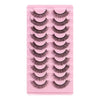 A pink plastic tray holding a set of dramatic mink false eyelashes.