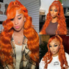 A woman modeling a long, loose wave orange wig with an orange-red hair color and lace front.