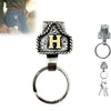 Silver letter H pendant on a belt keychain with a silver ring.