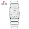 A silver-toned quartz watch with a metal bracelet and a square face is shown against a white background.