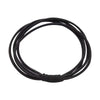 Black durable elastic hair ties coiled into a circular shape