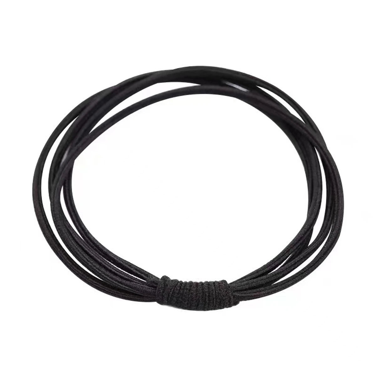 Black durable elastic hair ties coiled into a circular shape