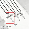 Three stainless steel cross pendant necklaces of different sizes displayed on a white background
