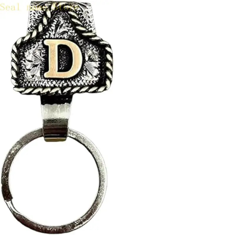 Silver and gold textured letter D pendant on a ring keychain.