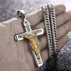 A gold-colored retro Christian cross amulet necklace is displayed on a person's hand next to silver chain bracelets.