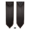A bundle of long, straight black hair extensions with clip-in attachments.
