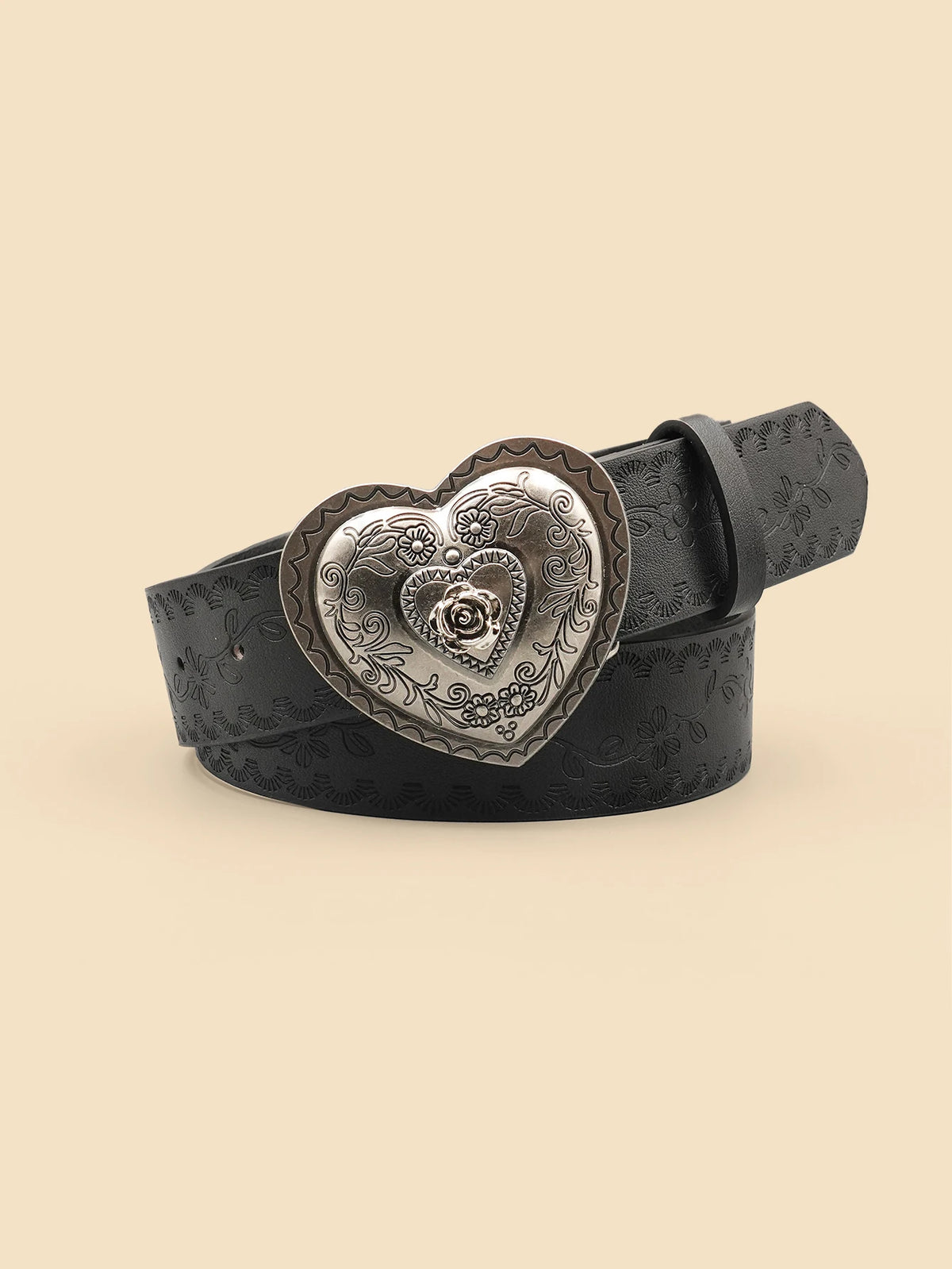 A black leather belt with a heart-shaped silver embossed buckle featuring a smaller heart design.
