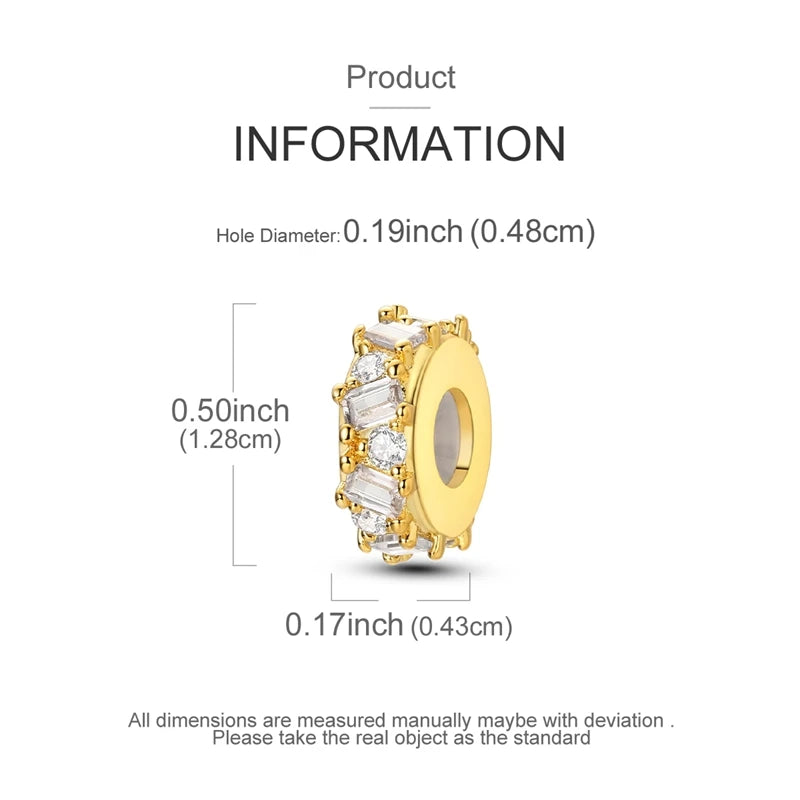 A gold-colored charm bracelet featuring a hexagonal pendant with clear stones and a round bead.