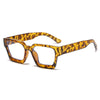 A pair of square anti-blue light computer glasses with a leopard print pattern.