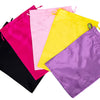 A collection of satin wig storage bags in pink, yellow, purple, and black with drawstrings.
