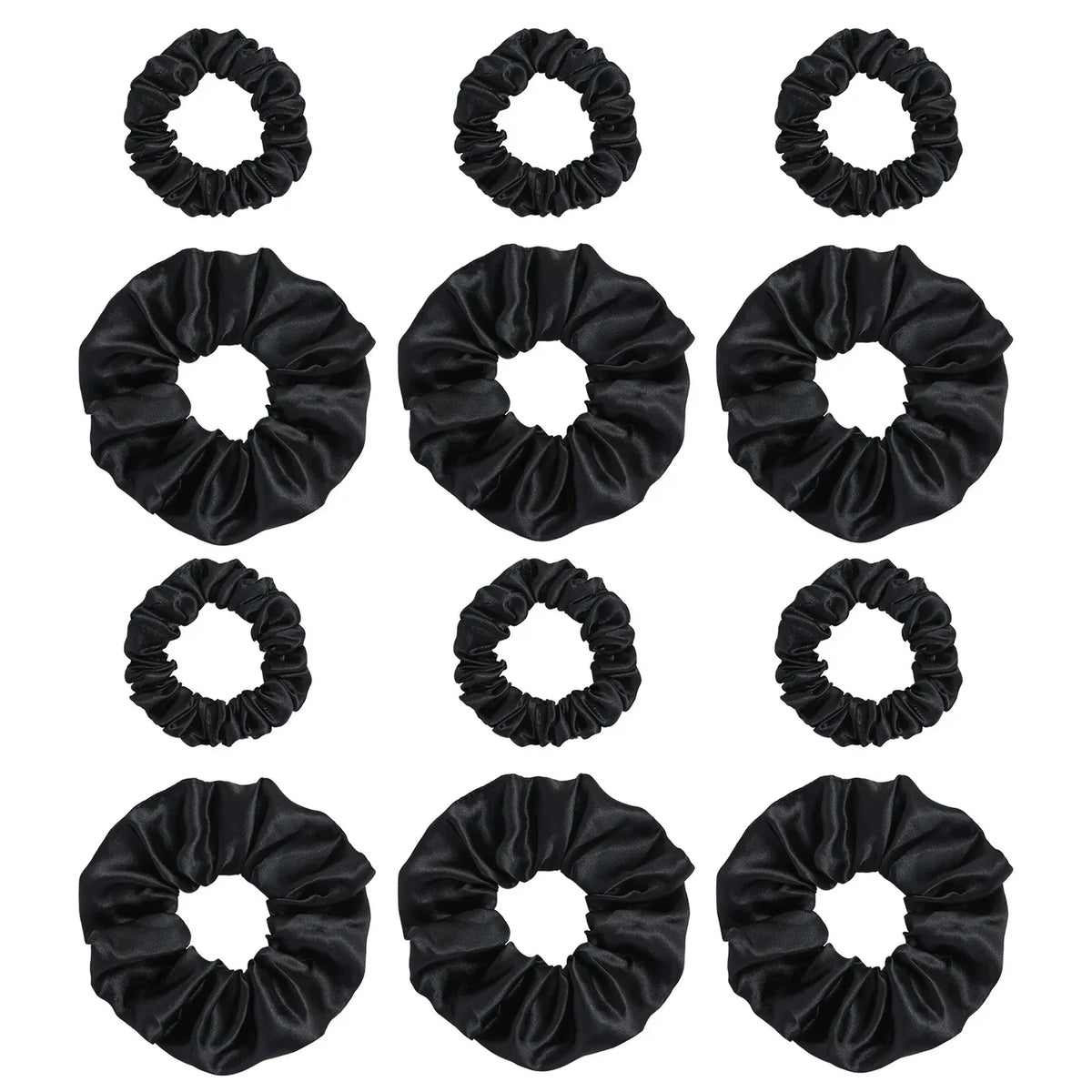 A set of black satin elastic hair ties for ponytail holders.