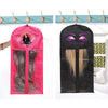 A pink wig cap with a gold crown and a black wig inside, displayed next to a black wig cap.