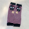 Black and pink striped fingerless socks featuring skull and flower designs