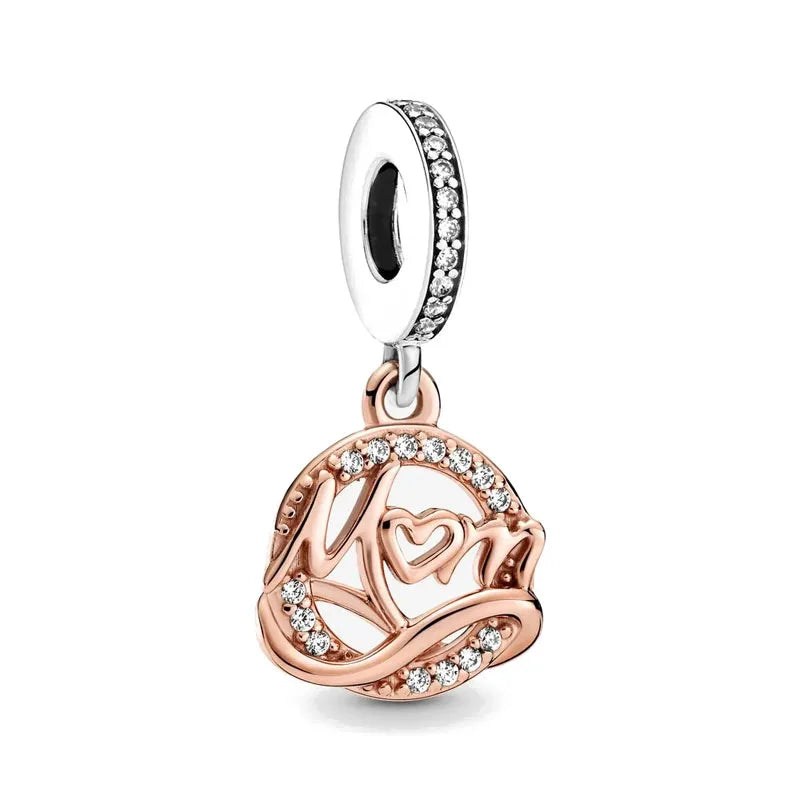 Rose gold cherry blossom charm pendant with a round bail and heart design